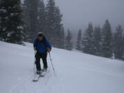 Carlos Cummings heads to the top of Todd Ridge at Todd Lake, Ore., on March 7, on his splitboard.