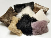 An assortment of fur pillows, both real and faux, make for last minute gifts for the holidays.