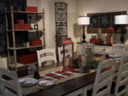 The designers at Ashley Furniture in Ballwin, Missouri, set up several holiday decor scenes in their showroom on Manchester Road.