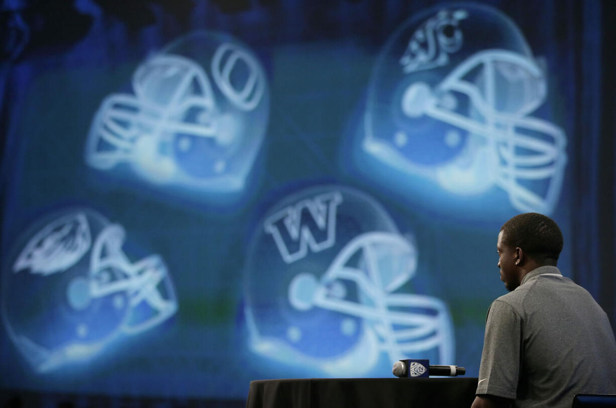 Washington defensive back Sean Parker listens to a question from the media at the NCAA college football Pac-12 media day on Friday in Culver City, Calif.