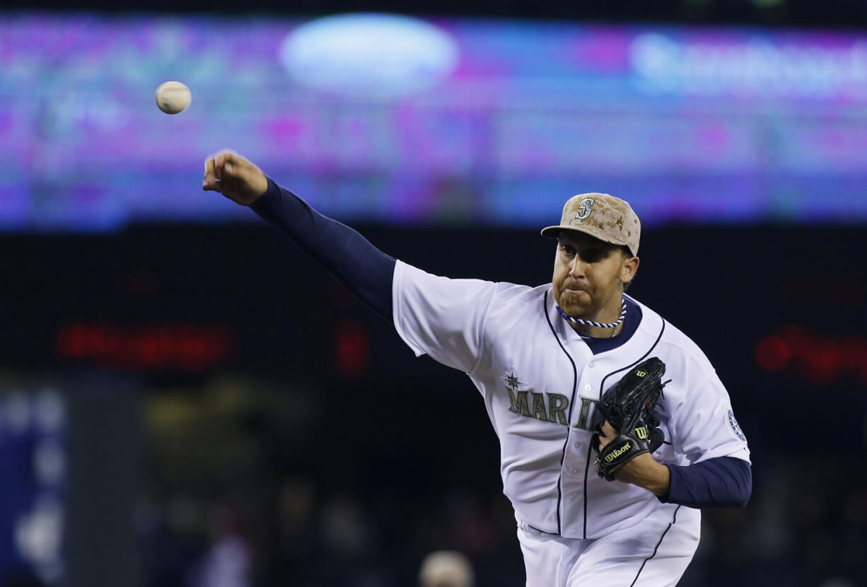 Aaron Harang pitched a complete game shutout as the Mariners defeated the Padres 9-0.