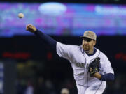 Aaron Harang pitched a complete game shutout as the Mariners defeated the Padres 9-0.