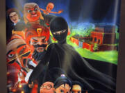 A poster of animated Burka Avenger series is displayed at an office in Islamabad, Pakistan, on Wednesday.