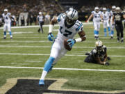 Carolina Panthers wide receiver Devin Funchess (17) touchdown in front of New Orleans Saints cornerback Brandon Browner (39) in the second half of an NFL football game in New Orleans, Sunday, Dec. 6, 2015.