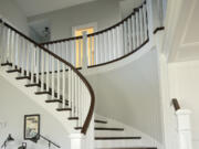 This sweeping staircase is one of several dramatic design elements featured in the award-winning The Nantucket, a showcase model displayed in the 2013 NW Natural Parade of Homes, held in July.