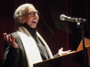 Film critic Roger Ebert welcomes people to the opening of the 13th annual Ebertfest film festival on the University of Illinois campus in Champaign in 2011.