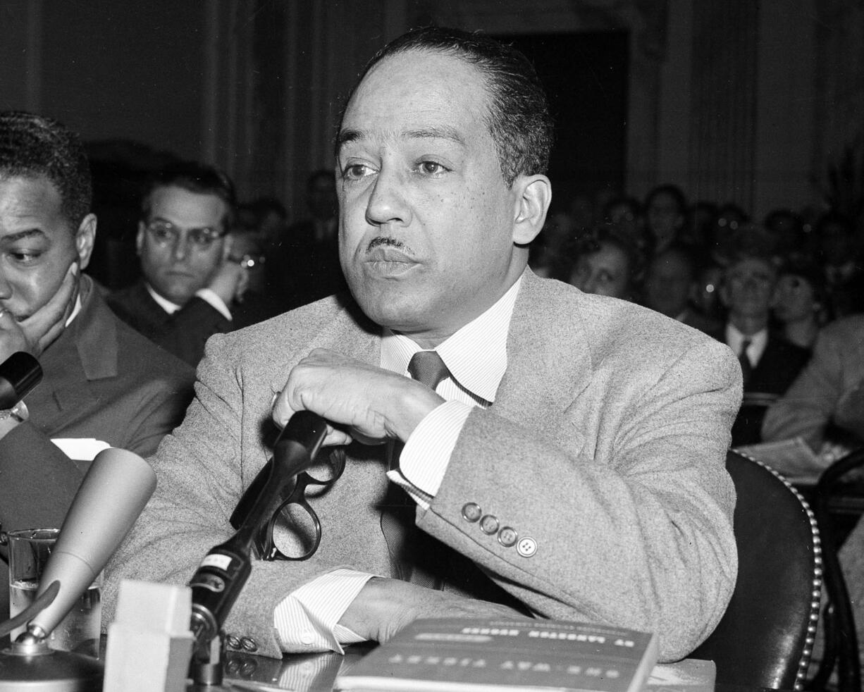 Associated Press files
Poet and author Langston Hughes speaks March 26, 1953 before the House Un-American Activities Committee in Washington, D.C. Hughes, Adrienne Rich, Allen Ginsberg, and Wallace Stevens are among the poets whose work recently became available in electronic format.