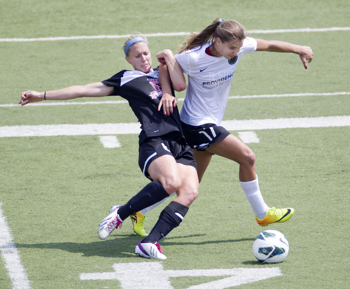 Portland's Tobin Heath, right, will return from U.S.