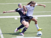 Portland's Tobin Heath, right, will return from U.S.