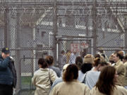 Corrections guard Tom Lovell at the Washington Corrections Center for Women is responsible for managing the movement of an ever increasing number of inmates at the over capacity state prison in Purdy on Thursday.