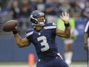 Seahawks starting quarterback Russell Wilson leads a roster of young players into the NFL season today against the Carolina Panthers.