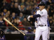 Seattle Mariners' Kyle Seager throws his bat aside after striking out against the Texas Rangers to end the fourth inning Saturday.