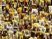 Fans in a special section for Seattle Mariners starting pitcher Felix Hernandez cheer and hold up &quot;K&quot; cards for strikeouts during a game against the Tampa Bay Rays, Wednesday in Seattle.