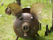 Artwork at the 2012 Recycled Arts Festival included a pig made from recycled metal by Cedar Creek Inc.