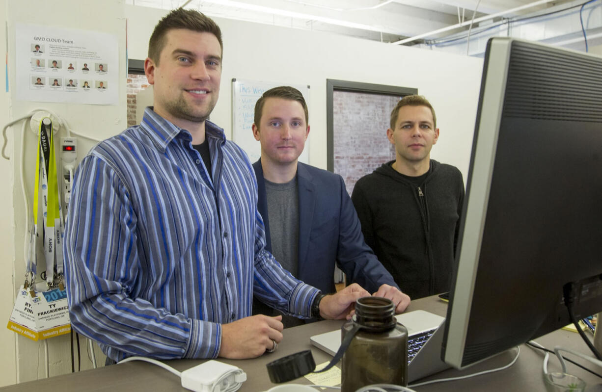 Ty Frackiewicz, from left, and Ryan Fink and Gary Peck, co-founders of ONtheGO Platforms, will remain in Portland following the recent sale of their gesture software company to Atheer, a Mountain View, Calif., developer of software for smart glasses.