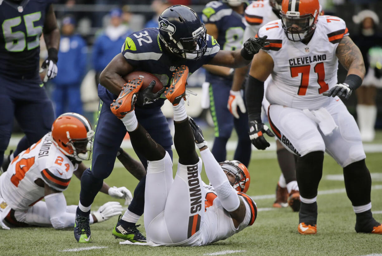 FILE - In this Dec. 20, 2015, file  photo, Seattle Seahawks&#039; Christine Michael (32) carries against the Cleveland Browns during an NFL football game in Seattle. Michael rushed for a career-high 84 yards on just 16 carries in Seattle?s win over Cleveland. It was the kind of performance Seattle waited to see from Michael since he was a second-round pick by the team in 2013. (AP Photo/Ted S.