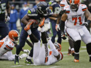 FILE - In this Dec. 20, 2015, file  photo, Seattle Seahawks&#039; Christine Michael (32) carries against the Cleveland Browns during an NFL football game in Seattle. Michael rushed for a career-high 84 yards on just 16 carries in Seattle?s win over Cleveland. It was the kind of performance Seattle waited to see from Michael since he was a second-round pick by the team in 2013. (AP Photo/Ted S.