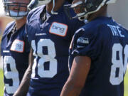 Seattle Seahawks wide receivers, from left, Bryan Walters, Sidney Rice and Golden Tate.