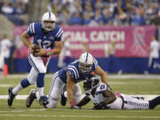 Indianapolis Colts quarterback Andrew Luck scramble against the Seattle Seahawks during the first half Sunday.