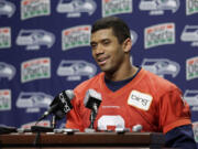 Seattle Seahawks quarterback Russell Wilson takes command of the press conference on Thursday in Renton.