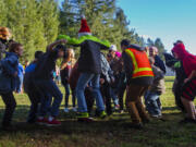 Sixth-grade students jump to help researchers measure the way seismic waves move through soil at Lackamas Elementary School in Yelm, near Olympia. (Photos by Ellen M.
