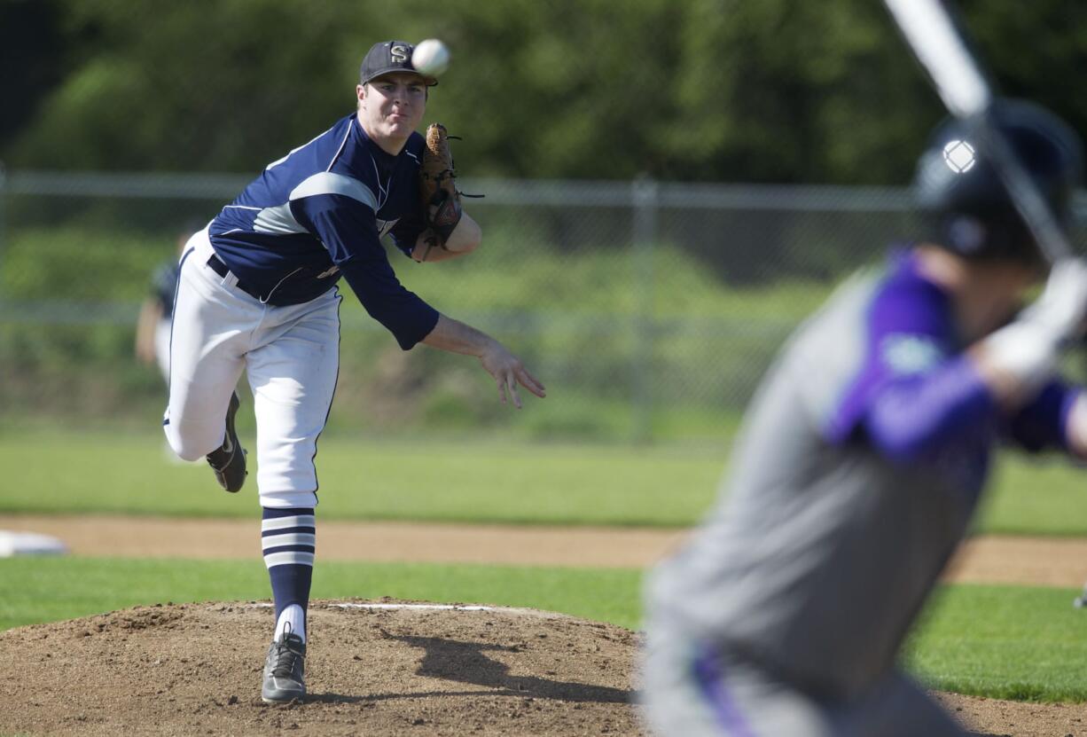 Skyview baseball player Adam Walker pitches against Heritage, Friday, April 26, 2013.