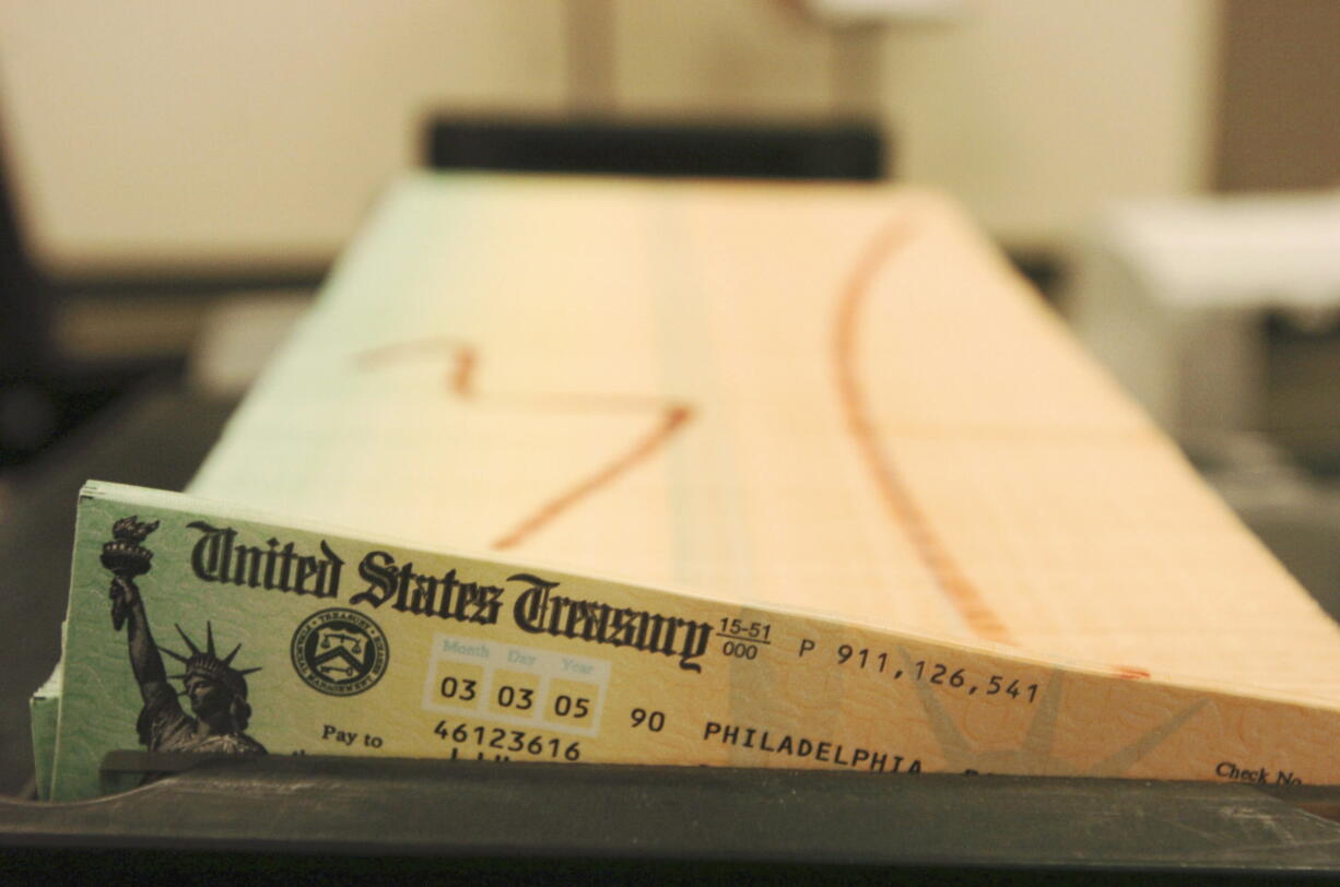 Trays of printed social security checks wait to be mailed  in 2005 from the U.S. Treasury's Financial Management services facility in Philadelphia.