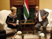 South African President Jacob Zuma, right, meets South African-born Hollywood actress Charlize Theron at his Union Building office in Pretoria, South Africa, on Monday.