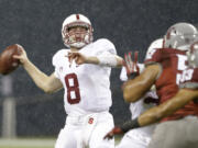 Stanford quarterback Kevin Hogan drops back to pass against Washington State in the second half Saturday.