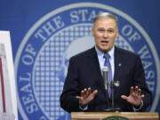 Washington Gov. Jay Inslee talks about his proposed supplemental budget plan Thursday in Olympia. The plan would adjust the current two-year state budget, including putting more money toward covering wildfire costs and increasing mental health spending. Inslee also announced a separate proposal to increase teacher pay. (AP Photo/Ted S.