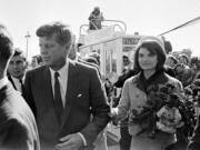 President John F. and Jacqueline Kennedy arrive Nov.