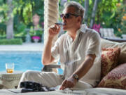 This publicity image released by Starz, shows Danny Huston in a scene from the second season of the series &quot;Magic City,&quot; set in Miami, Fla.  The second season premieres Friday, June 14 at 9 p.m. on Starz.