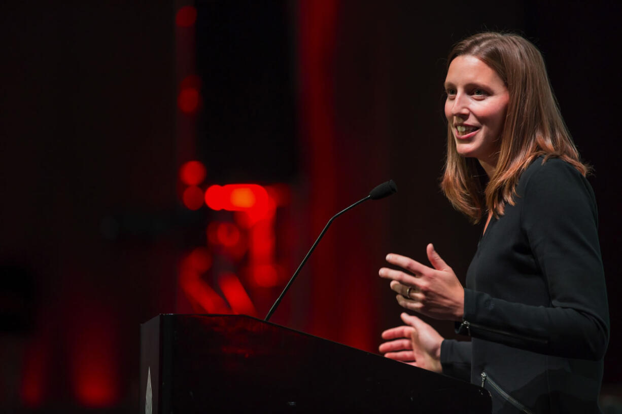 Katie Brown, a teacher from Shuksan Middle School in the Bellingham School District, gives a speech after being named the 2014 Washington State Teacher of the Year during a ceremony and announcement event Monday at the EMP Museum in Seattle.