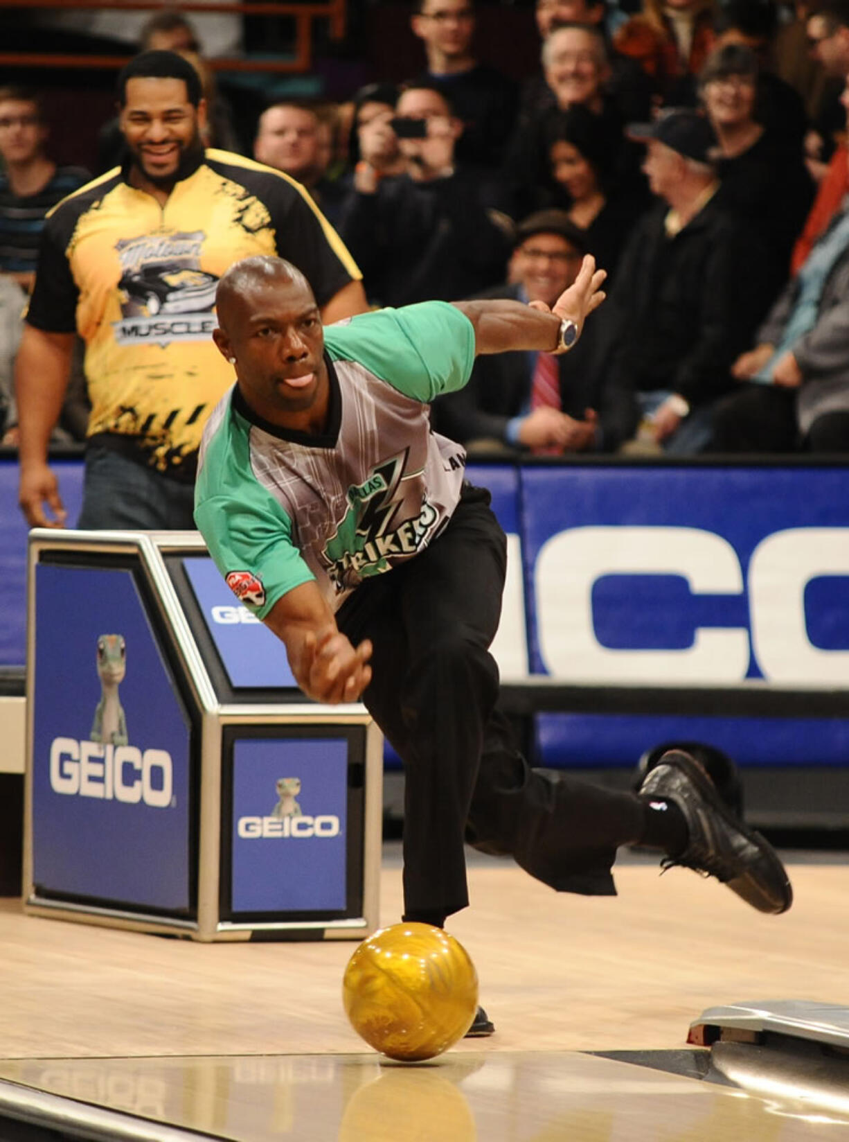 In this photo taken on Jan. 27, 2013, and provided by the Professional Bowlers Association, former NFL football player Terrell  Owens bowls during the PBA Detroit Winter Swing at Thunderbowl Lanes in Allen Park, Mich. Owens has finally found a sport where he doesn't have to worry about getting the ball. He wants to be a professional bowler.