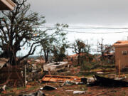 Ar Granbury, Texas, backyard is reduced to rubble where resident Nichole Tomlin says there used to be a neighborhood. A rash of tornadoes slammed into several small communities in North Texas overnight, leaving at least six people dead, dozens more injured and hundreds homeless.