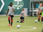 Vancouver resident Tina Ellertson warms up before a Portland Thorns game July 31 at Jeld-Wen Field.