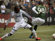 Portland's Mamadou &quot;Futty&quot; Danso (98), here against Vancouver's Darren Mattocks, has been a solid defender.