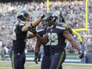 Seattle Seahawks cornerback Brandon Browner (39) celebrates his interception and touchdown Saturday.