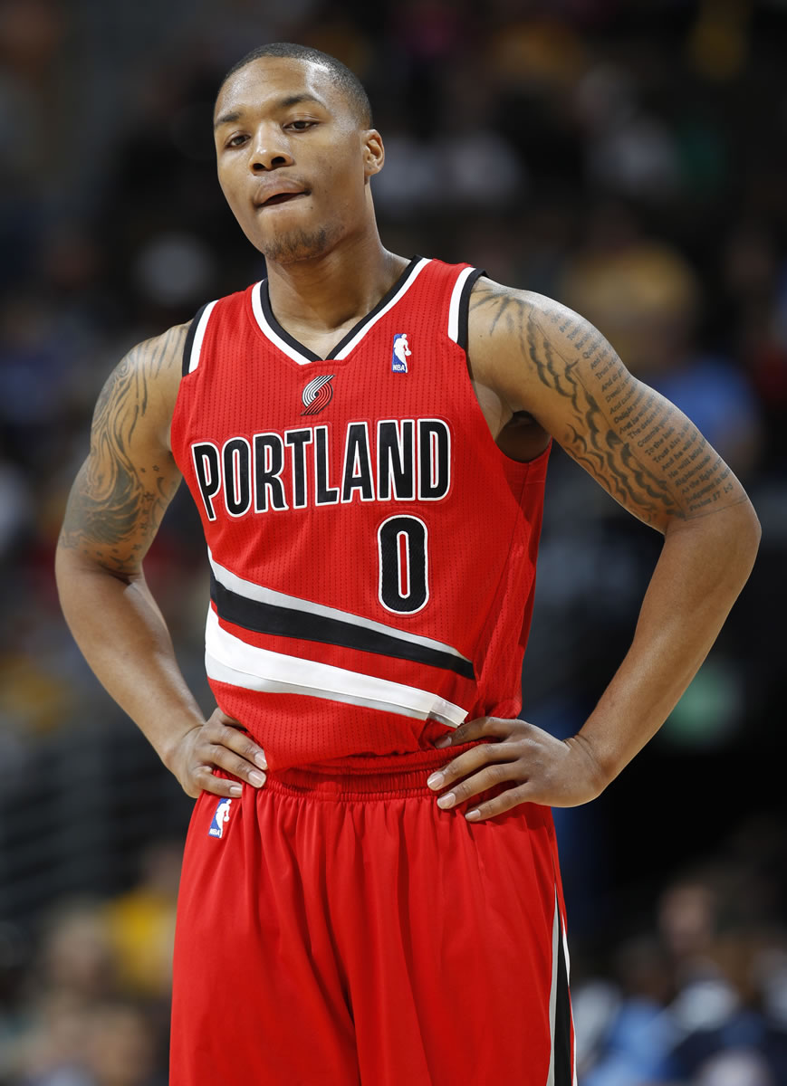 Portland Trail Blazers guard Damian Lillard shows the frustration on his face as the Blazers go down to the Nuggets in Denver on Sunday for their 11th straight defeat.