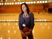 Gabrielle Ludwig, a 6-foot-6-inch transsexual player on Mission College's women's basketball squad, reflects on her return to college ball on Friday, Dec. 7, 2012, in Santa Clara, Calif. Gabrielle Ludwig made sports history this month as a basketball player at a Northern California community college. The 50-year-old transsexual, Army veteran, father and Mission College freshman is believed to be the first hoopster to play college ball as both a man and a woman.