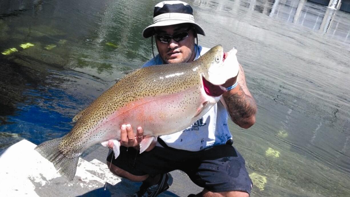 Tui Moliga of Lapwai, Idaho, and his monster trout.