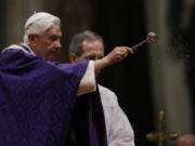 Pope Benedict XVI blesses the ashes as he celebrates the Ash Wednesday mass in St. Peter's Basilica at the Vatican, Wednesday, Feb. 13, 2013.  Ash Wednesday marks the beginning of Lent, a solemn period of 40 days of prayer and self-denial leading up to Easter. Pope Benedict XVI told thousands of faithful Wednesday that he was resigning for &quot;the good of the church&quot;, an extraordinary scene of a pope explaining himself to his flock that unfolded in his first appearance since dropping the bombshell announcement.