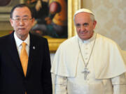 Pope Francis, right, is planning to meet with Cardinals in October.