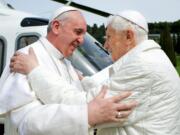 Pope Francis, left, meets Pope emeritus Benedict XVI in Castel Gandolfo on March 23.