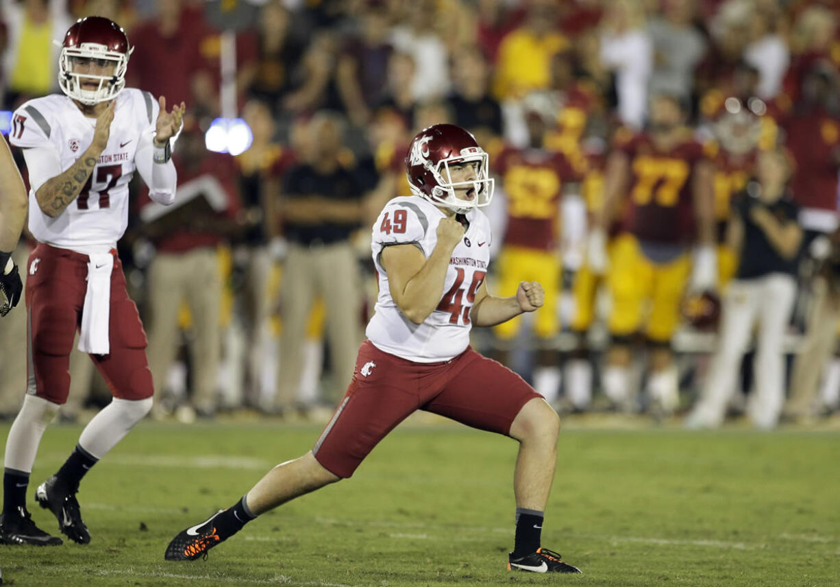 Washington State kicker Andrew Furney celebrates his go-ahead 41-yard field goal with 3:03 to play against Southern California on Saturday.