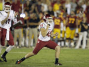 Washington State kicker Andrew Furney celebrates his go-ahead 41-yard field goal with 3:03 to play against Southern California on Saturday.