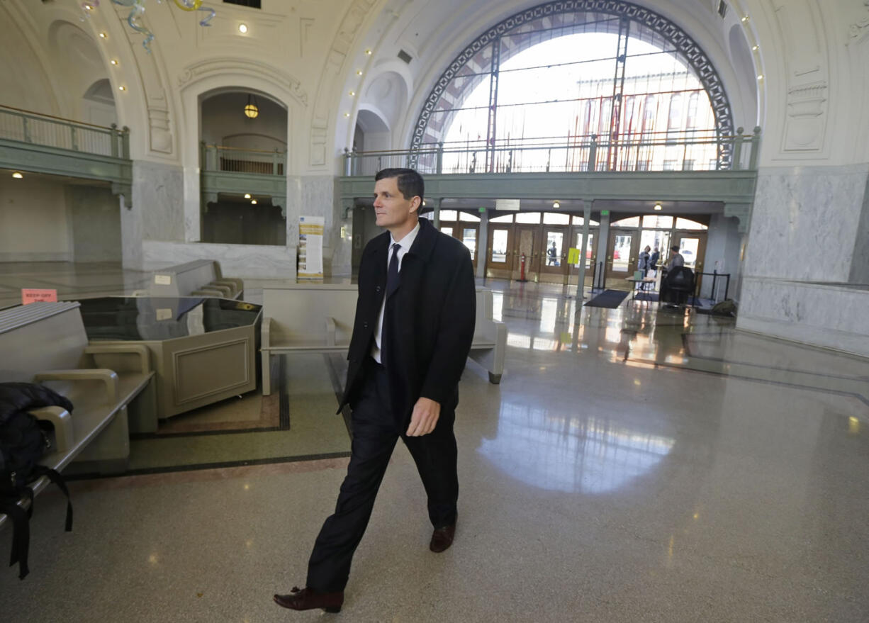 Washington state auditor Troy Kelley arrives for a federal court hearing Tuesday in Tacoma.  (AP Photo/Ted S.