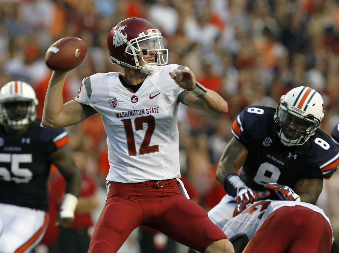 Washington State quarterback Connor Halliday (12) looks to throw against Auburn during the second quarter Saturday.