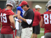 Dean Hare/The Associated Press
Mike Leach's first game as college coach since being fired by Texas Tech in 2009 is against his alma mater.