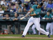 Thee Mariners' Raul Ibanez hits a two-run home run in the third inning of Seattle's win over the Chicago White Sox.